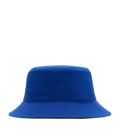 Shop Burberry Reversible Check Bucket Hat In Blue