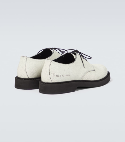 Shop Common Projects Cracked Leather Derby Shoes In White