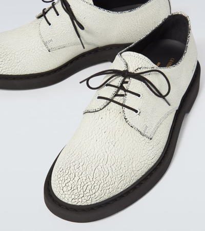 Shop Common Projects Cracked Leather Derby Shoes In White