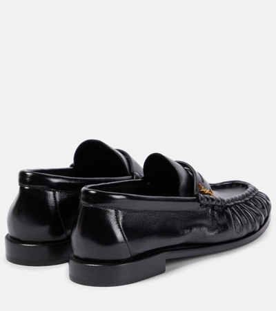 Shop Saint Laurent Le Loafer Leather Loafers In Noir