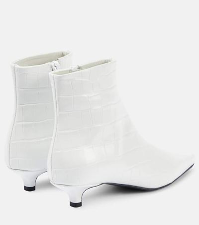 Shop Totême The Croco Slim Leather Ankle Boots In White 