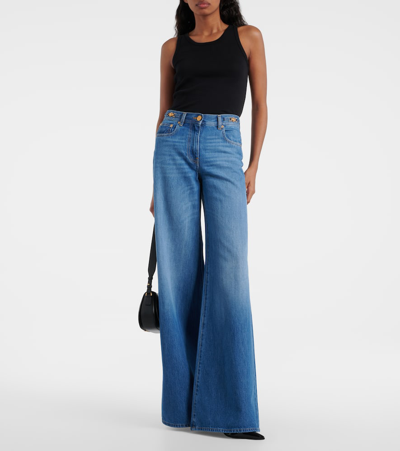 Shop Versace Medusa '95 High-rise Flared Jeans In Medium Blue