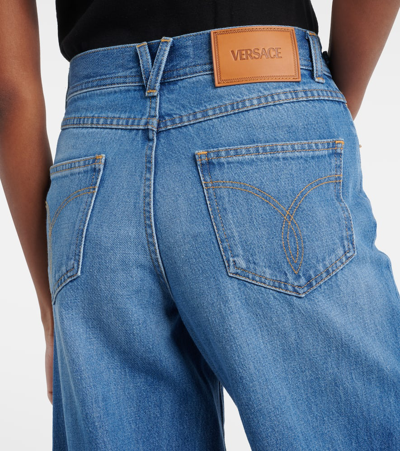 Shop Versace Medusa '95 High-rise Flared Jeans In Medium Blue