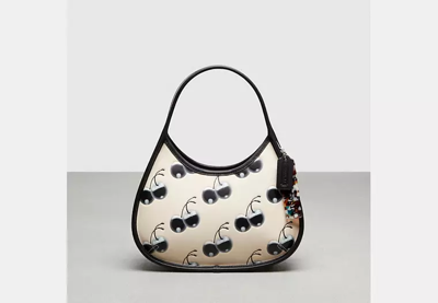 Shop Coach Outlet Ergo Bag In Coachtopia Leather With Cherry Print In White