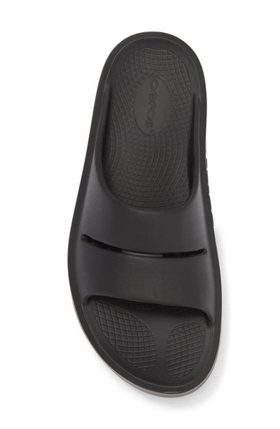 Oofos Oomega Ooahh Slide Sandal In Black
