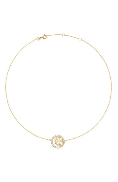 Shop Tory Burch Miller Pavé Double Ring Pendant Necklace In Tory Gold / Crystal