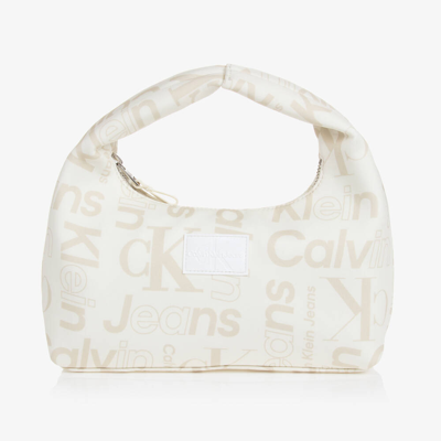 Shop Calvin Klein Girls Beige Monogram Handbag