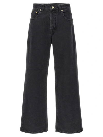 Shop Jacquemus 'le De-nîmes Large' Jeans In Black