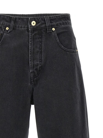 Shop Jacquemus 'le De-nîmes Large' Jeans In Black