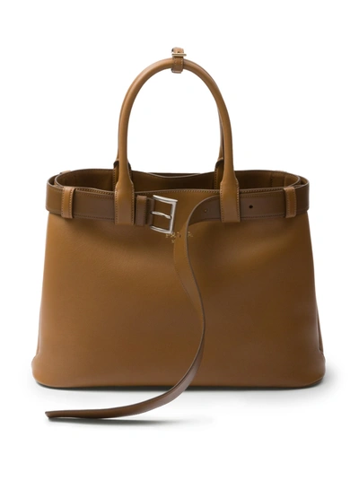 Shop Prada Buckle Large Leather Handbag In Brown