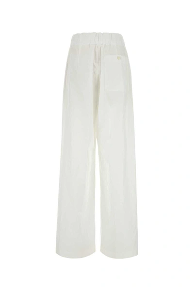 Shop Dries Van Noten Pants In White