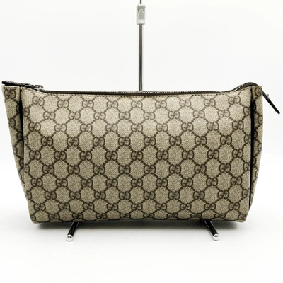 Shop Gucci Baguette Brown Canvas Clutch Bag ()