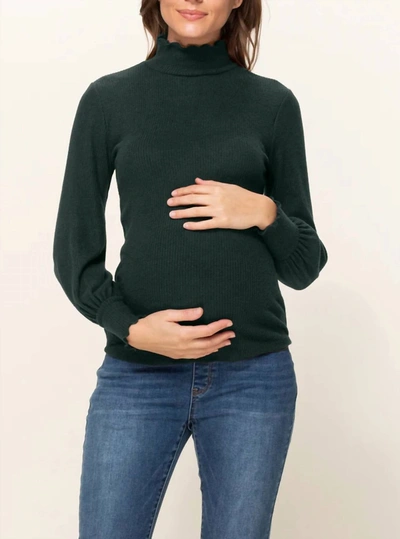 Shop Hello Miz Curly Hem Mock Neck Ribbed Sweater Knit Maternity Top In Dark Green