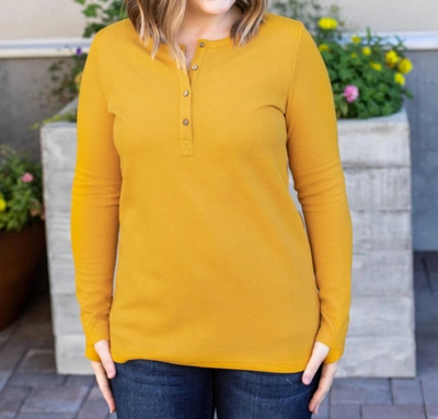 Shop Michelle Mae Harper Henley Long Sleeve Top In Mustard In Yellow