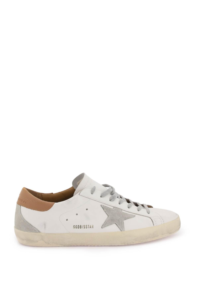 Shop Golden Goose Super-star Sneakers In White,brown