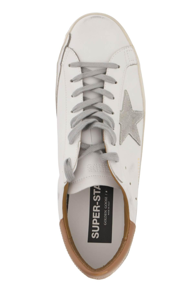 Shop Golden Goose Super-star Sneakers In White,brown
