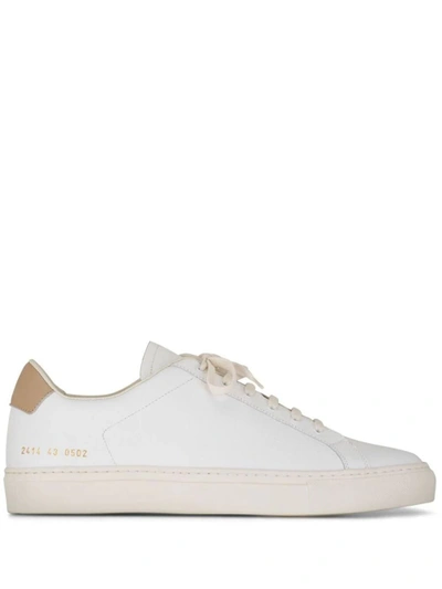 Shop Common Projects Retro Bumpy Sneaker Shoes In White