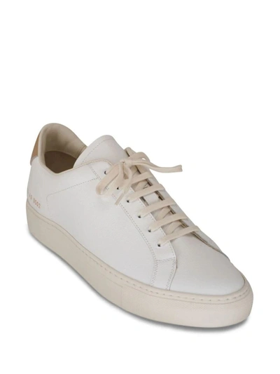 Shop Common Projects Retro Bumpy Sneaker Shoes In White