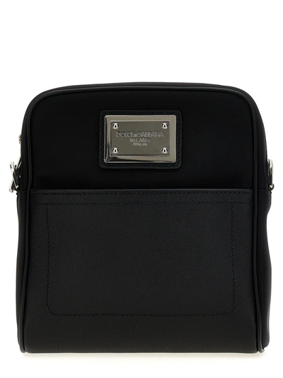 Shop Dolce & Gabbana Logo Plaque Shoulder Strap Crossbody Bags Black