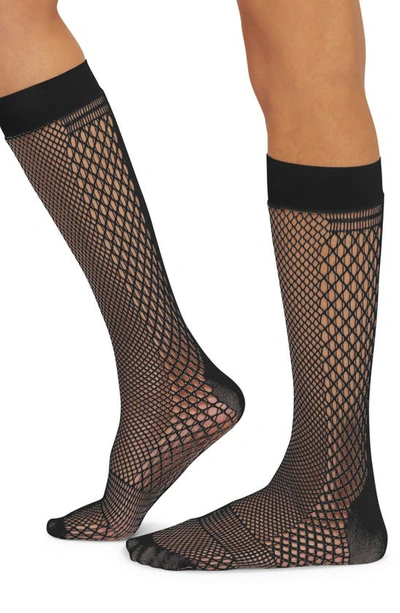 Shop Wolford Fishnet Knee High Socks In Black