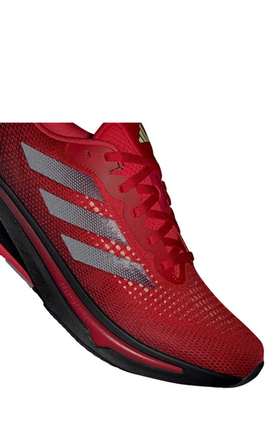 Shop Adidas Originals Supernova Rise Running Shoe In Scarlet/ Black/ Green Spark