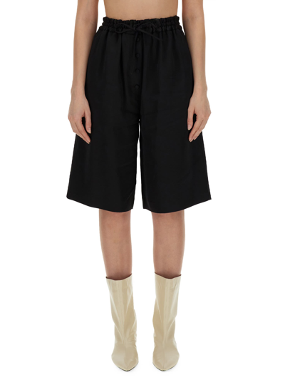 Shop Jil Sander Wide Leg Bermuda Shorts In Nero