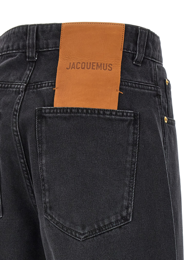 Jacquemus Le De-nîmes Large High Rise Wide Jeans In Black