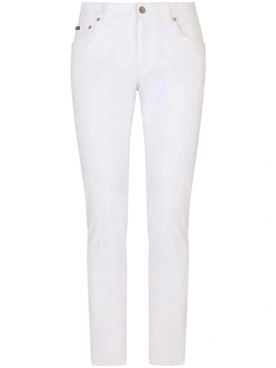 Shop Dolce & Gabbana Slim Jeans With Logo Plaque In White