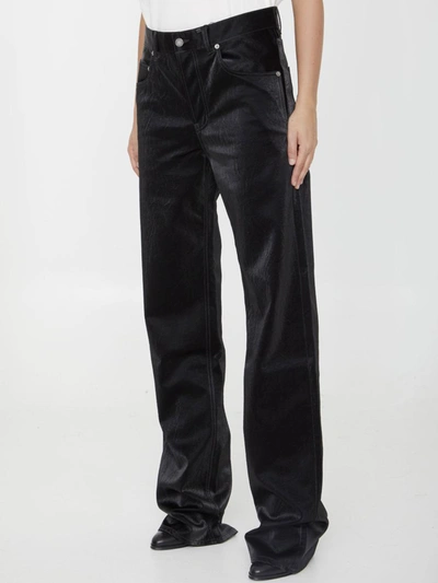Shop Saint Laurent Extra Long Jeans In Black