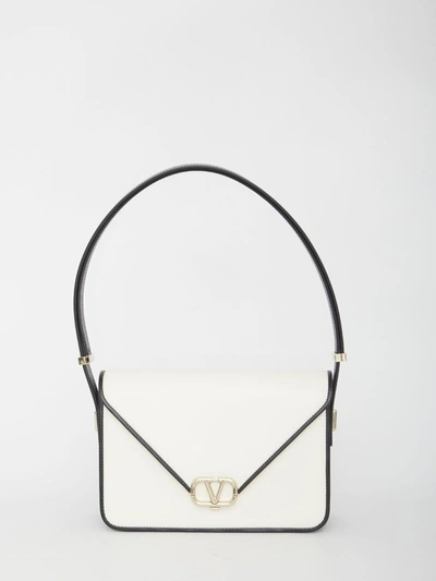 Shop Valentino Letter Bag In Cream