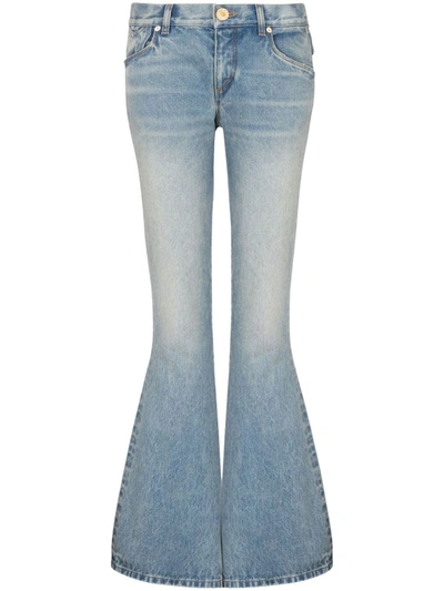 Shop Balmain Western Flared Jeans With Low Waist In Blue