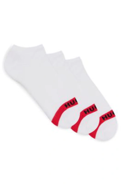 Shop Hugo Three-pack Of Invisible Socks With Logo Details In White