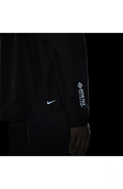 Shop Nike Trail Cosmic Peaks Gore-tex® Infinium™ Water Resistant Packable Jacket In Black/ Anthracite/ Anthracite