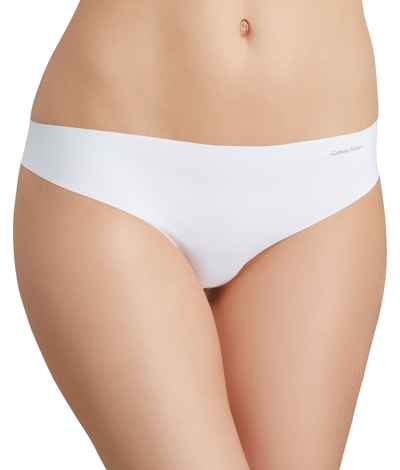 Shop Calvin Klein Women's Invisibles Thong In White