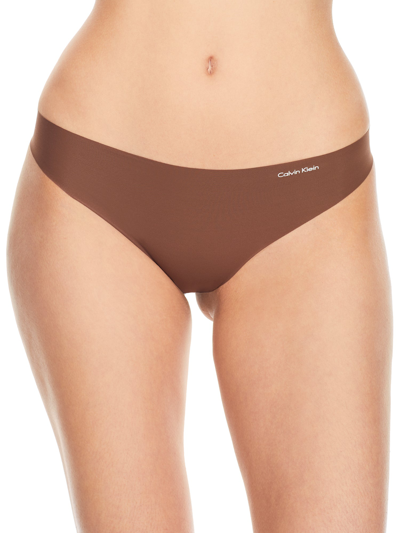 Shop Calvin Klein Women's Invisibles Thong In Pink