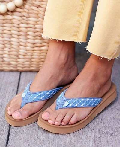 Shop Minnetonka Women's Hedy Flip Flop In Light Blue Denim