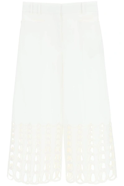 Shop Stella Mccartney Cropped Pants With Embroidered Hem In White