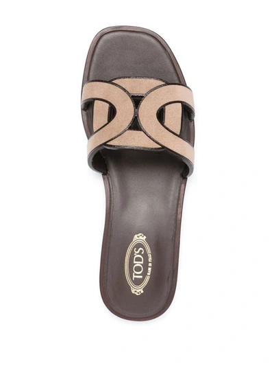 Shop Tod's Leather Flat Sandals In Beige