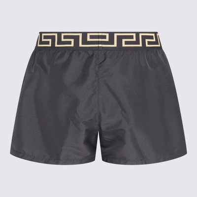 Shop Versace Black And Gold-tone Swim Shorts