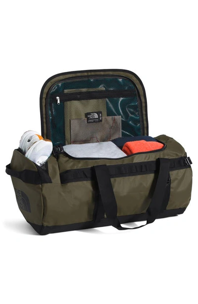 Shop The North Face Base Camp Water Resistant Medium Duffle In New Taupe Green/ Tnf Black