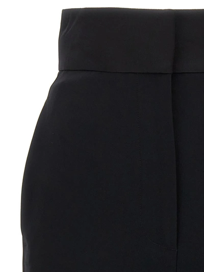 Shop Alexander Mcqueen Satin Detail Trousers In Black