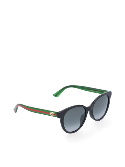 Shop Gucci Glasses In Black/green/grey