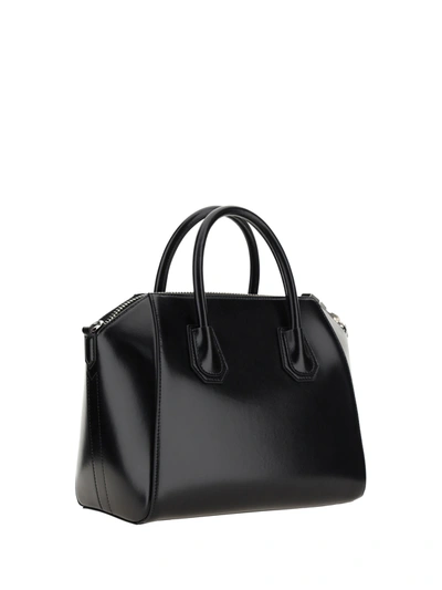Shop Givenchy Leather Handbag With Engraved Logo On The Front