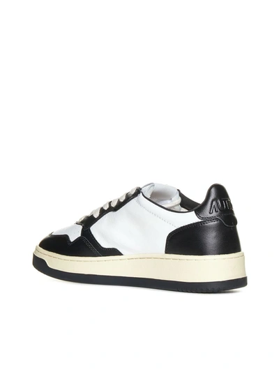 Shop Autry Sneakers In Leat/leat Wht/blk
