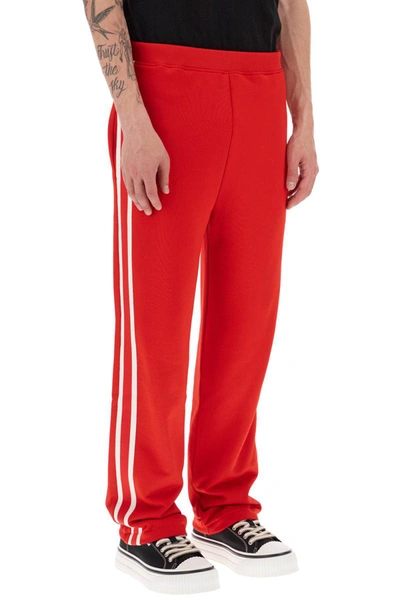 Shop Ami Alexandre Mattiussi Ami Paris Track Pants With Side Bands In Red