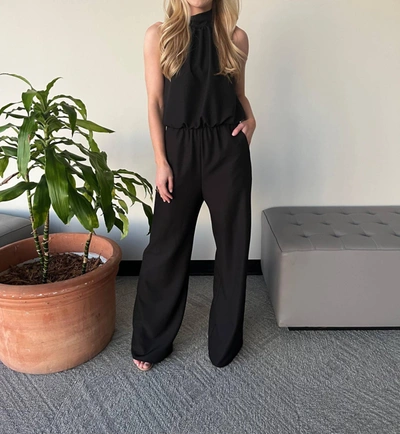 Shop Carole's Collections Halter Jumpsuit In Black