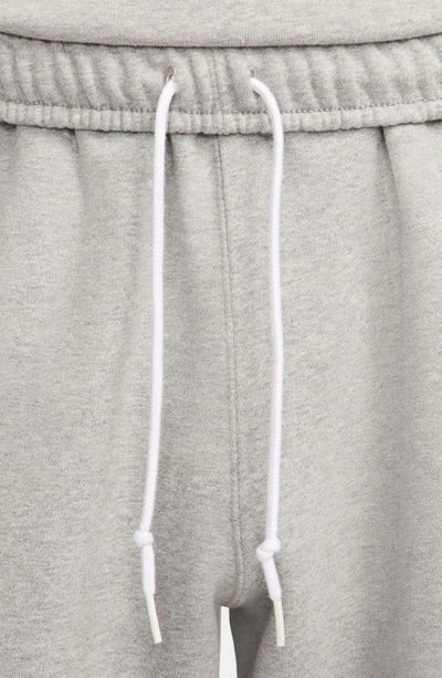 Shop Nike Solo Swoosh Fleece Sweat Shorts In Dark Grey Heather/ White