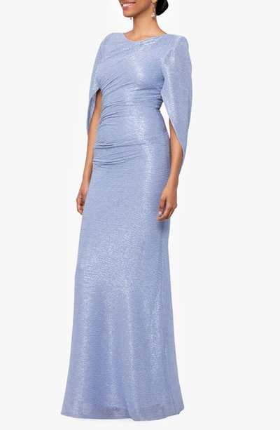 Shop Betsy & Adam Metallic Crinkle Cape Sleeve Trumpet Gown In Blue/ Silver