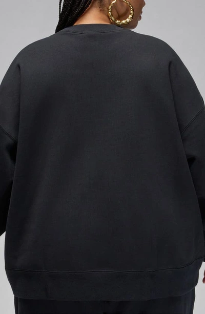 Shop Jordan Flight Fleece Oversize Crewneck Sweatshirt In Black