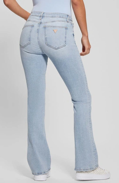 Shop Guess Flare Leg Jeans In Blue